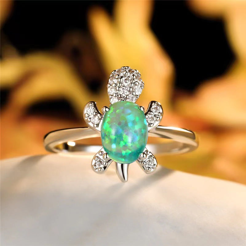 Platinum Ring With A Colored Tortoise Design Featuring Blue Diamondsunisex