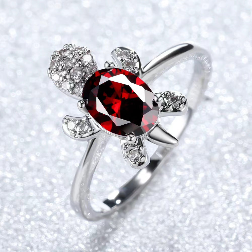 Platinum Ring With A Colored Tortoise Design Featuring Blue Diamondsunisex